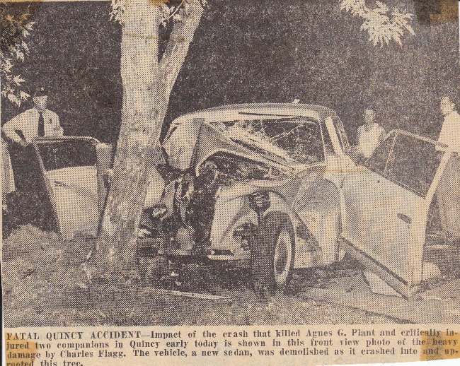 Antique car center punches tree