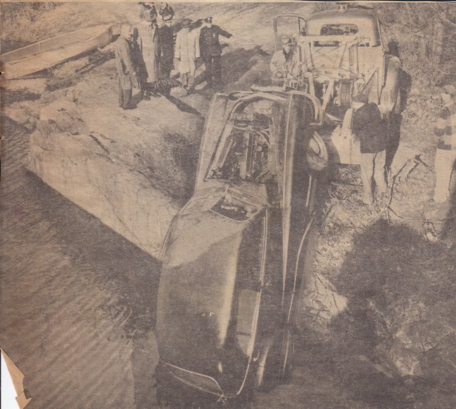 Car being pulled out of quarry