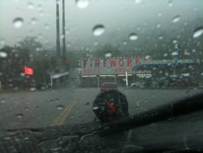 Buick hiding from rain