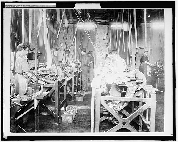 Workers at a Leland engine plant