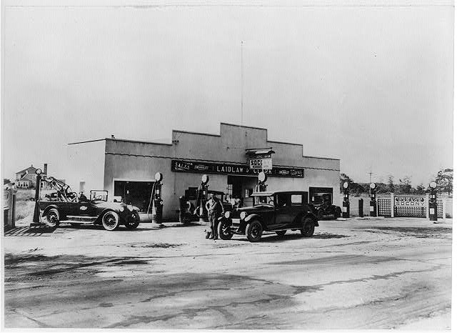 Ancient car dealership - check out the tow truck