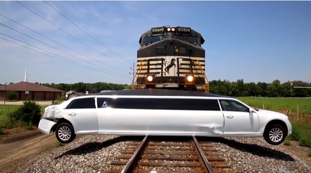 Carnage Video: This Poor Chrysler Limousine Is Another Victim To The Still-Undefeated Freight Train