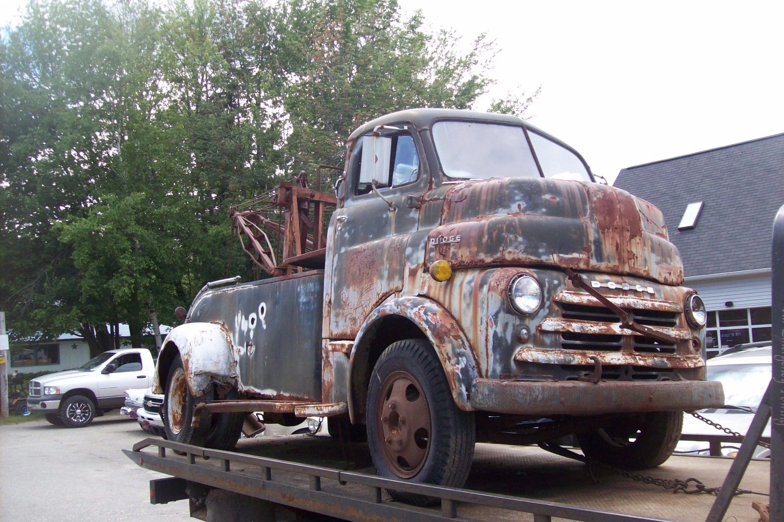 0 There is a cab over dodge wrecker for sale on ebay