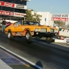 nhra-winternationals-wheelstanding-doorslammers-2012-043