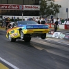 nhra-winternationals-wheelstanding-doorslammers-2012-099