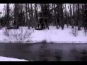 Painful Fail Video: A Snowmobile Crosses a Creek and Eats a Tree