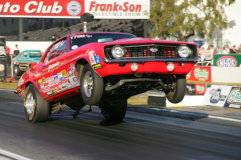 NHRA Winternationals Wheelstanding Stock and Super Stock Doorslammers Thursday 2012