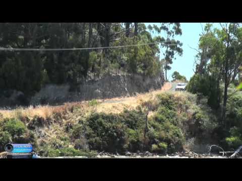 Flying Wreckage Video: An Aussie Rally Driver Launches Himself Over a Cliff and Into the Drink!