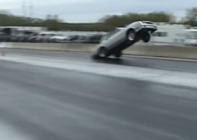 Watch a Monte Carlo Drag Car Pull All Four Wheels Off the Ground and Still Win a Drag Race!