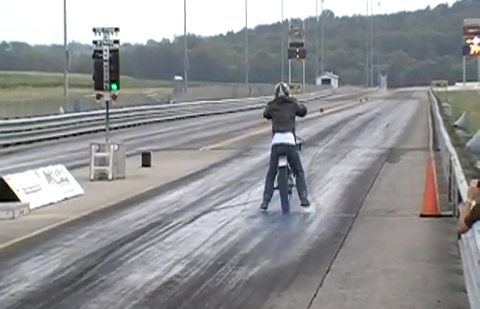 Watch A 1960s Vintage Triumph Drag Bike Try To Launch Its Rider Onto The Strip