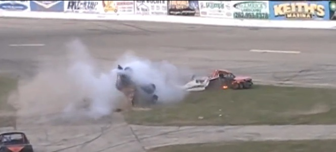 WHAM! Watch A Racer Suffer A Titanic Shot During A Figure Eight Race