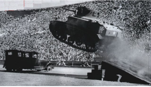 Epic Photo: An Old Tank in Mid-Flight – Help Us With the Back Story!