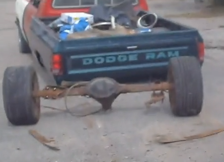 Watch A Ratty Old Dodge Truck Completely Spit A Rear Axle Out From Under Itself During A Burnout