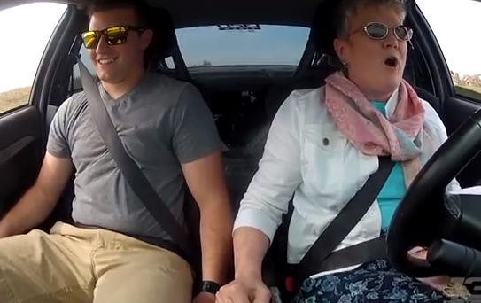 Hilarious Video: Watch A Middle Aged Mom Drive Her Son’s 900hp Mitsubishi Evo – She OWNS It!