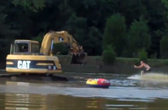 Hilarious Video: Watch A Dude Go Water Skiing With An Excavator For Propulsion – Big Time Fun!