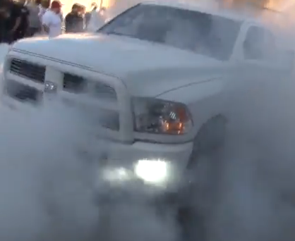 Video: Watch An 8,000 Pound Ram Diesel Try To Move A 15,000 lb Dumpster