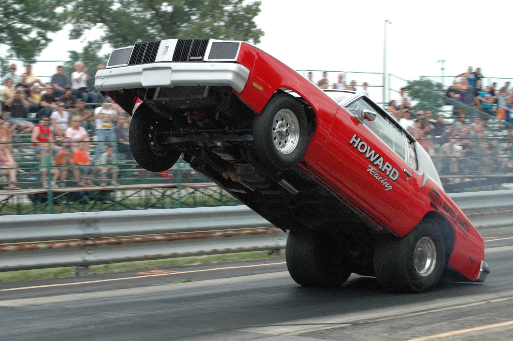 Wheelstand Video: Ride On The Roof Of Robert Howard’s Olds As He Wins The Bunker Hill Dragstrip Wheelstand Challenge! Badassery!