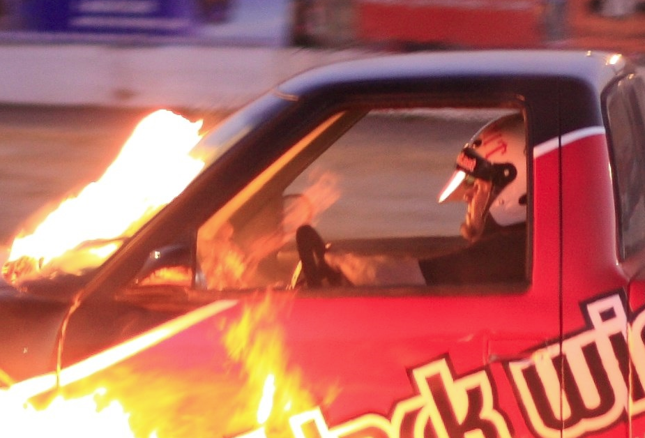 Caption This Photo: More Fire! Bill Speed Blows It Up On A Hot Lap In The Black Widow Exhaust S10 Pickup