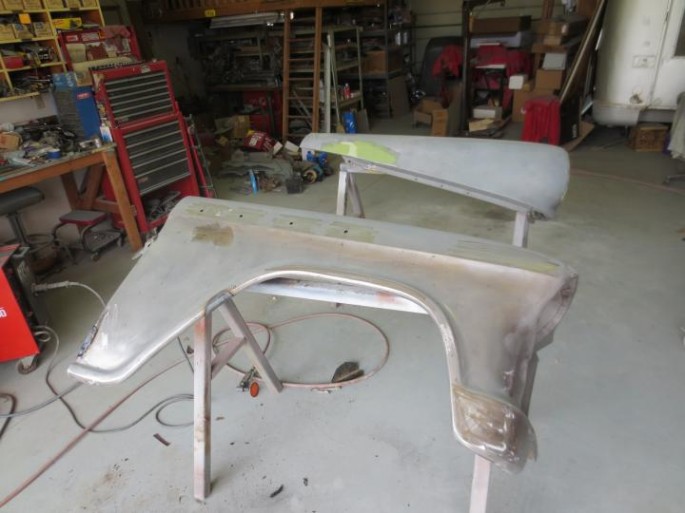 "I've been working on the fenders. First I had to add some pieces to the steel sawhorses to properly support the fenders, it makes life so much nicer. Cutting, welding, hammering, spreading plastic. It never seems to end."