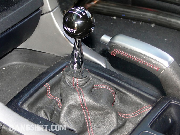 The iconic chrome Hurst shift lever and ball aren't just for looks. They are connected to a shifter that will make anyone look like a BangShifting hero. 