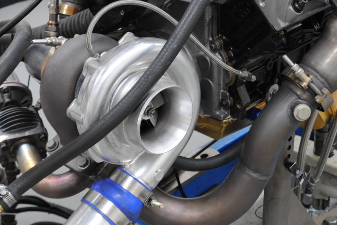 The kit was designed to accept a T4 turbo and CXRacing supplied one of their 76-mm turbos for our test. Before the day was done, we would test two larger turbos on this 383 stroker as well. 