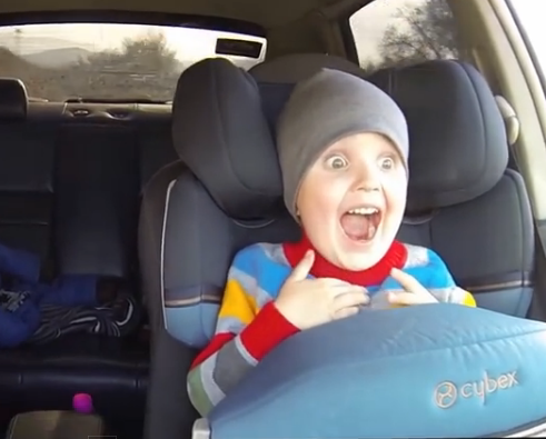 This Little Kid’s Reaction To Drifting Around In A Car With His Dad Is Flipping Awesome