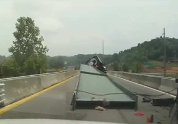 Watch A Trucker Hauling A Massive Steel Beam Miscalculate A Corner And The Disaster That Follows His Tiny Mistake