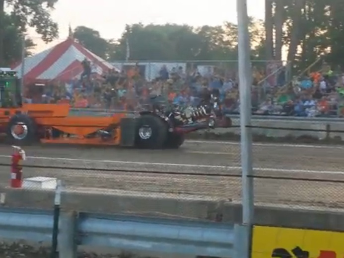 More Mini-Mod Wreckage – Watch This Tractor Get Plowed Over By The Sled It Is Pulling