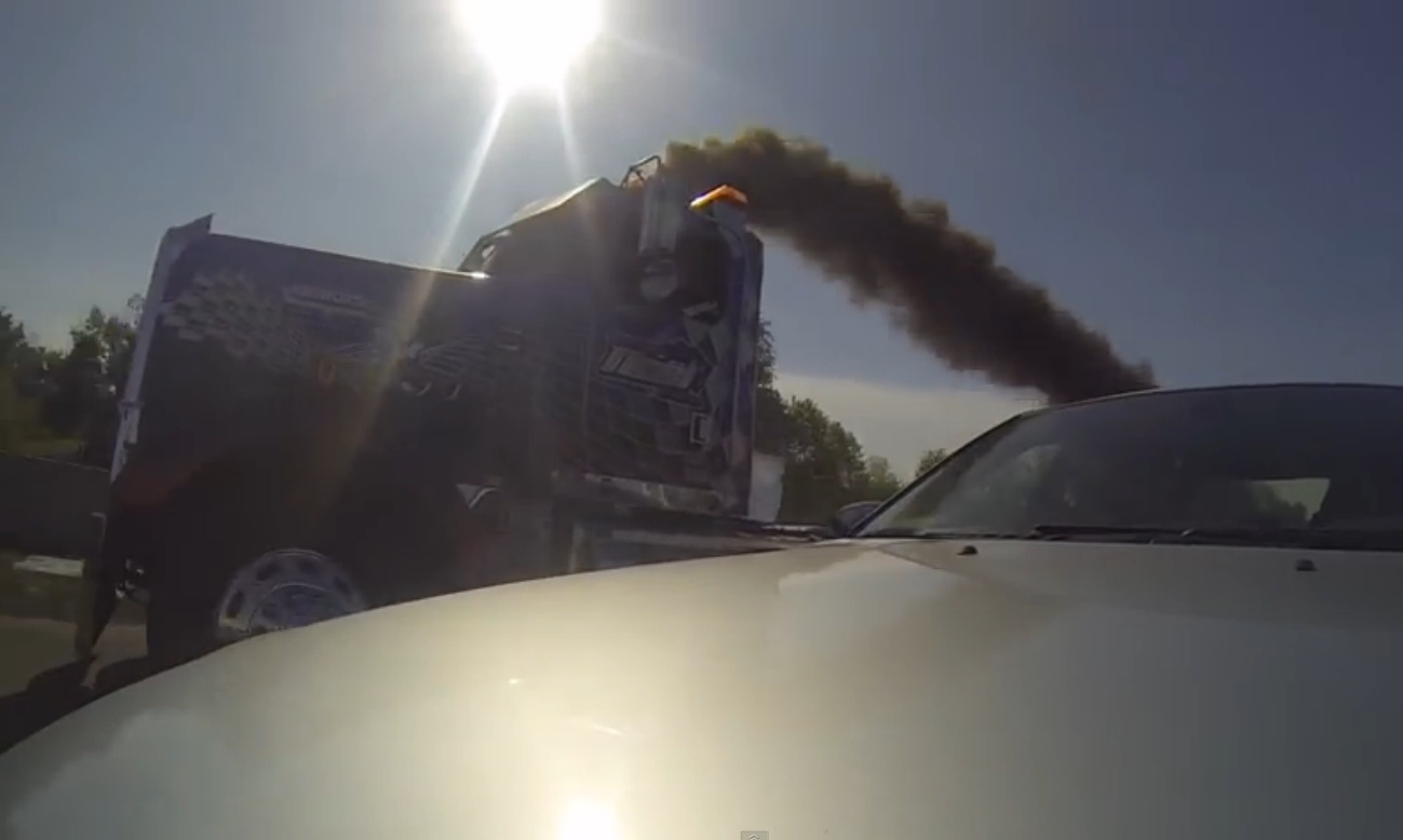 Watch This 2,000hp Big Rig Eat Up A BMW M5 At The Drag Strip From The Hood Of The M5