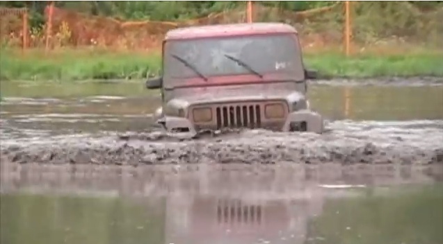 Watch This Nearly-Stock YJ Wrangler Show The Mud Trucks How It’s Done