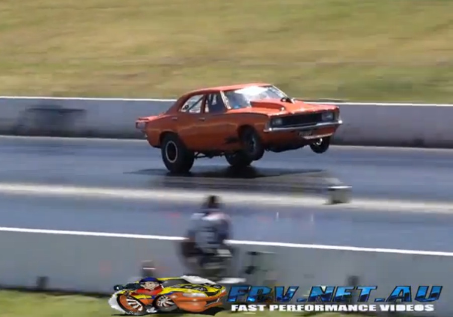 Watch Australia’s Meanest Outlaw Drag Radial Car Run Into the 6s And Pull Power Wheelies At Half Track!