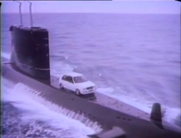 The Craziest Car Commercial Of The 1980s Involved Launching A Car Off An Aircraft Carrier And Strapping It To A Submarine