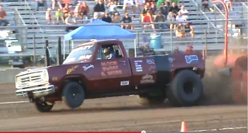 Watch This Puller Explode A Rear Tire And Never Lift – One Wheel Drive With A Spool Works Pretty Good!