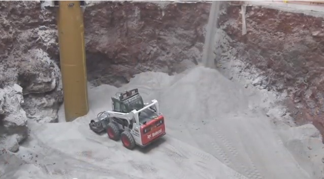 Must Be Hard Work: Watch Two Remote-Control Bobcats Fill In The National Corvette Museum’s Sinkhole!