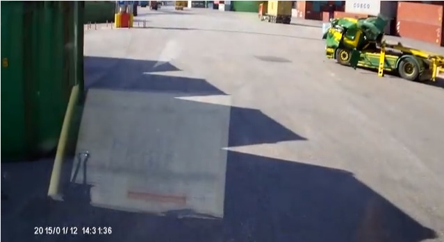 Greek Truck Driver Lucky To Be Alive After Container Falls On His Truck [VIDEO]