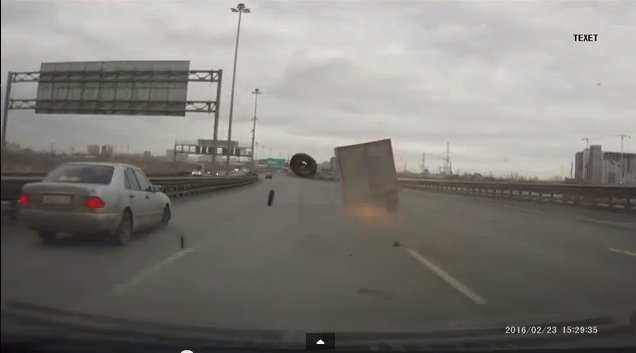 More Russian Dashcam Footage! A Truck Blows The Tires Off On A Major Roadway!