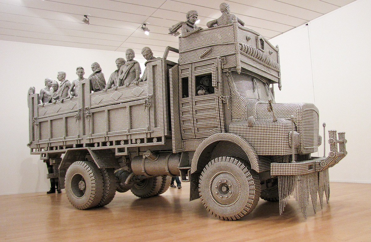 This Life Sized Dump Truck Is Made Of Thousands Of Small Stainless Steel Discs Welded Together