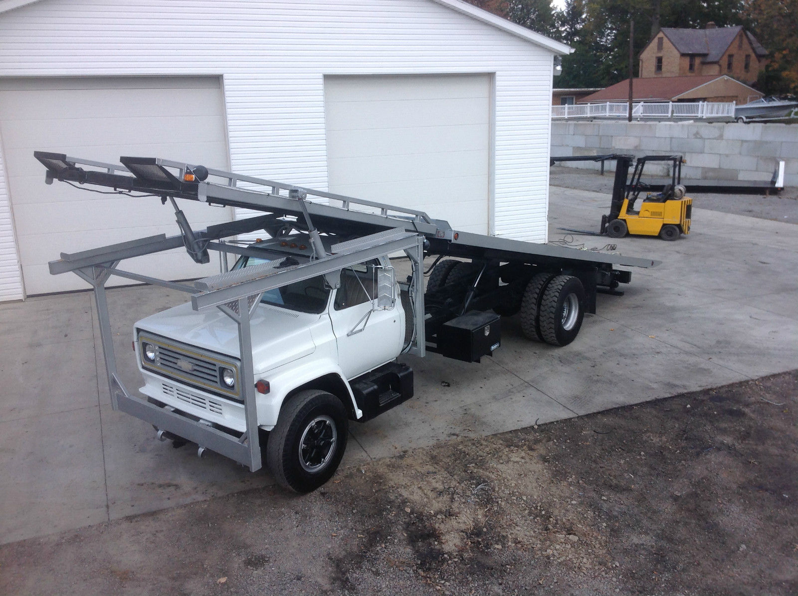 This 1981 Chevy C80 Is A Four Car Hauler/Rolling Stunt Launch Ramp You Have Always Wanted