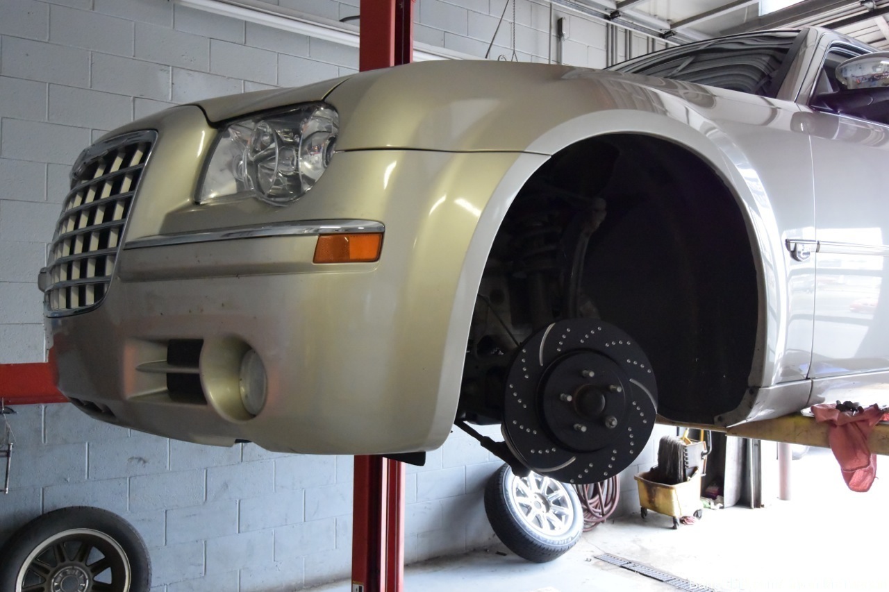 Project Angry Grandpa: Our Crotchety Chrysler Gets New Brakes And New Tortion Struts For His 100,000th Mile!