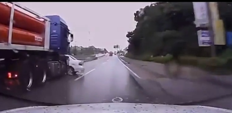 Insane Video: Watch This (Presumably) Road Raging Truck Driver Bulldoze A Car Down A City Street At Speed