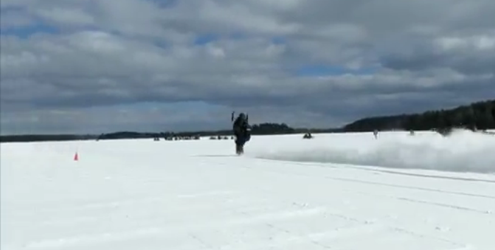 Snow Over? Watch This Snowmobile Power Itself Over Backwards (Rider OK)!