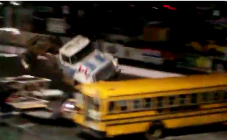 Watch a 1974 International Truck Fly Through the Air and Smash Into a School Bus Face First!