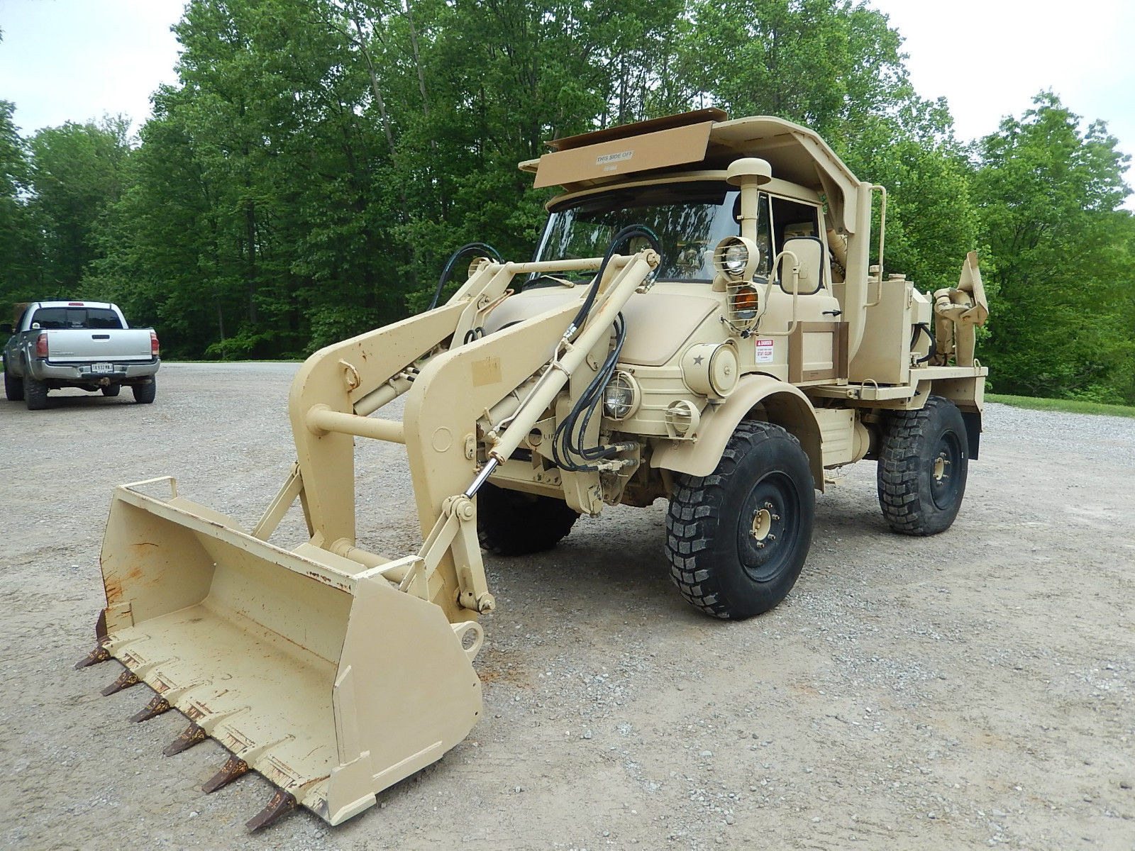 This Front End Loader And Backhoe Equipped Unimog Is Fully Functional, For Sale, And There is Video Of It Working