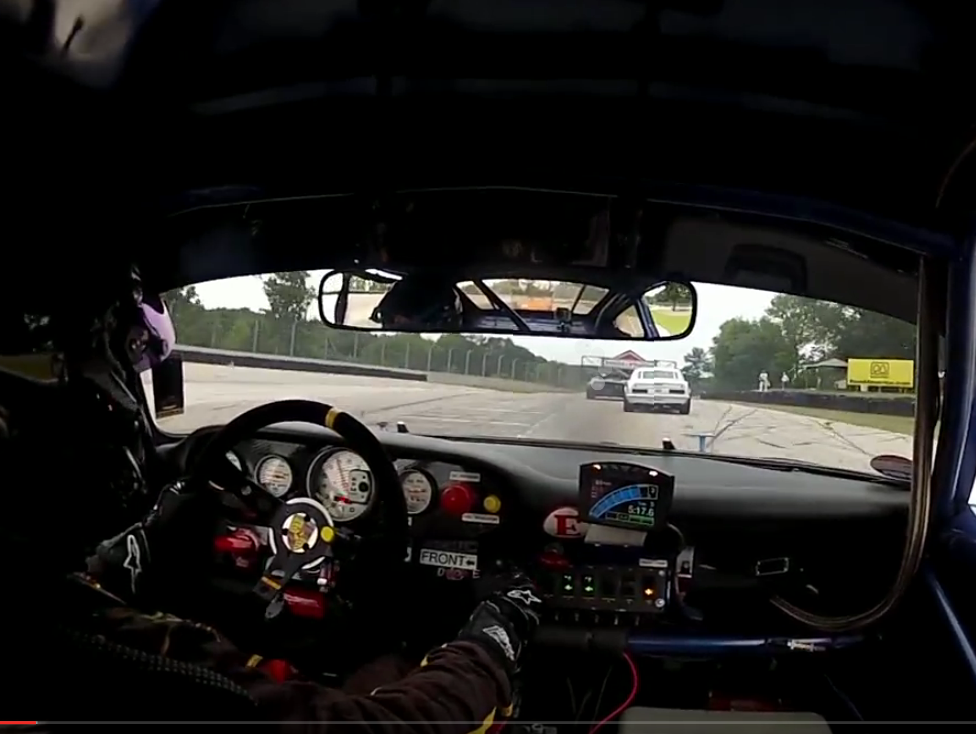 Watch Jim Pace Battle It Out With V8 Iron In A Porsche 911 RSR – This Is Great Racing!