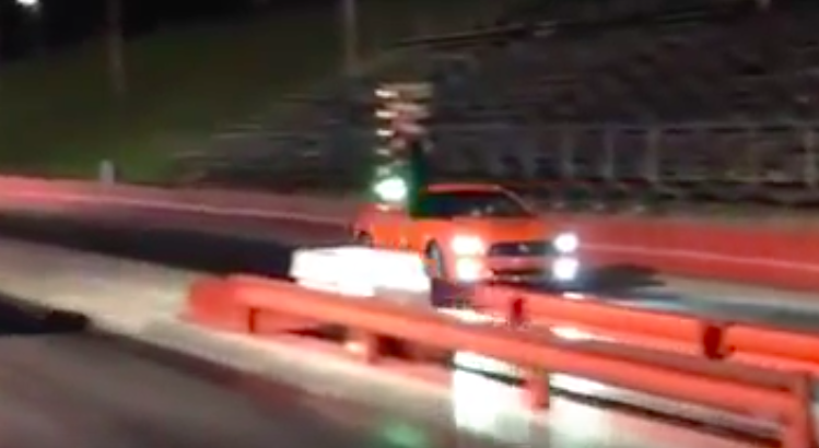 Watch A 2015 Mustang Race A VW Jetta Down The Strip…In Reverse!