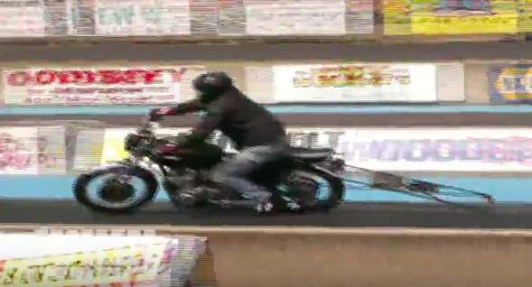 Motorcycle Drag Race Fail Video: Watch This Rider Go Over The Wall Like A Pommel Horse