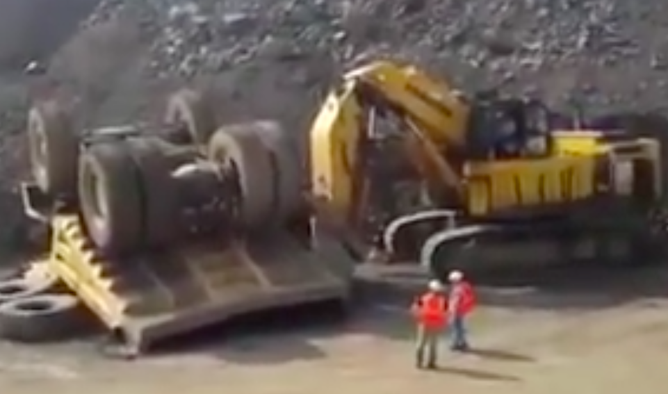 Watch These Miners Put A Massive Dump Truck Back On Its Wheels In Amazingly Gentle Fashion – 100% BS Approved!