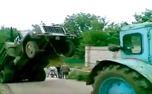 When A Tractor Attempts To Help A Truck In Russia, Always Expect The Unexpected