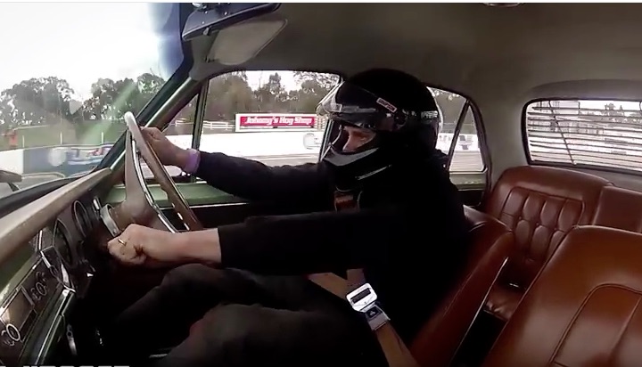 Totally Mental: Guy Runs 8s In Australia While Column Shifting, In A Stock Seat, With No Bar, and Stock Belts