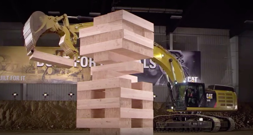 Watch Caterpillar Heavy Equipment Play The World’s Biggest Game Of Jenga